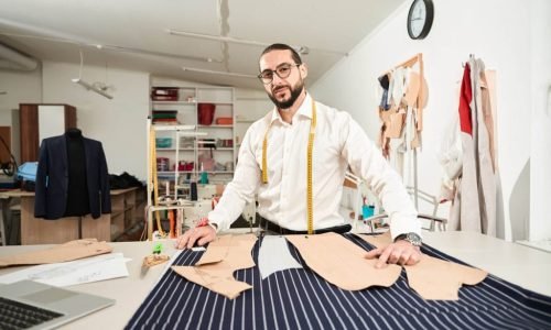 tailor-posing-at-his-workbench-in-studio-2026-01-08-07-59-50-utc-1024x682.jpg